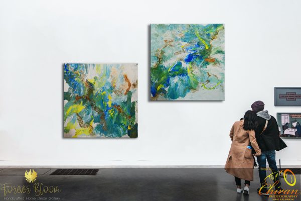 A couple looking at an abstract artwork done by studio forever bloom melbourne australia