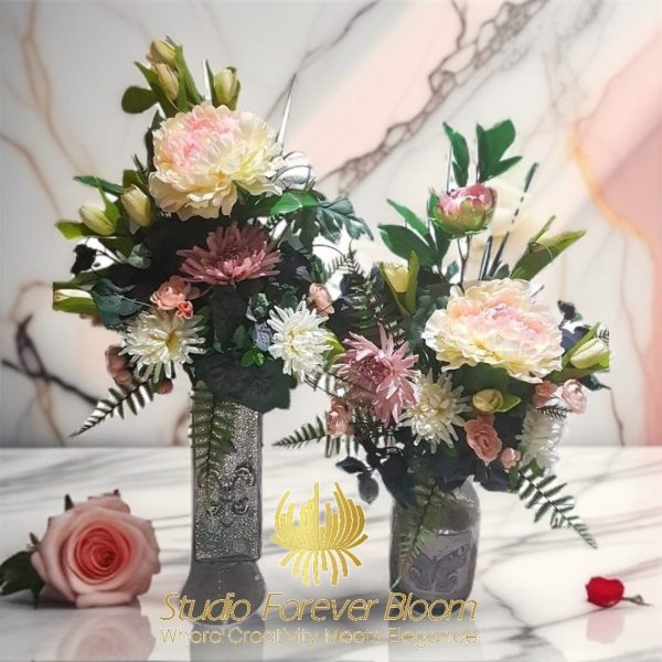 Pink and white flowers arranged in beautiful vases-gold