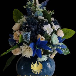 “Elegant ‘Euphoric Blues’ silk flower arrangement by Studio Forever Bloom, the ideal floral gift for any occasion.