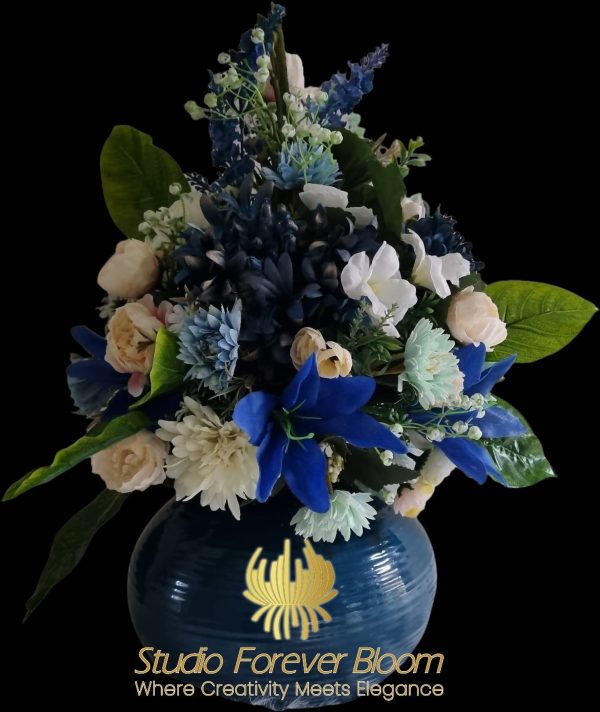 “Elegant ‘Euphoric Blues’ silk flower arrangement by Studio Forever Bloom, the ideal floral gift for any occasion.