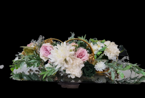 Elegant Floral Decor arranged in a beautiful decorate vase with golden rings