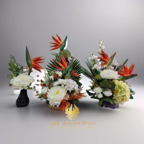 High-quality silk Birds of Paradise flowers used as a centrepiece for a tropical-themed wedding."