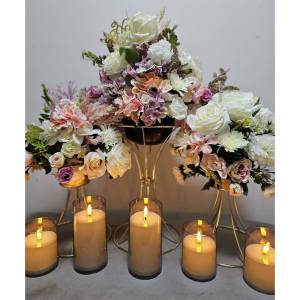 Birthday party centerpiece with silk flowers and candles Melbourne