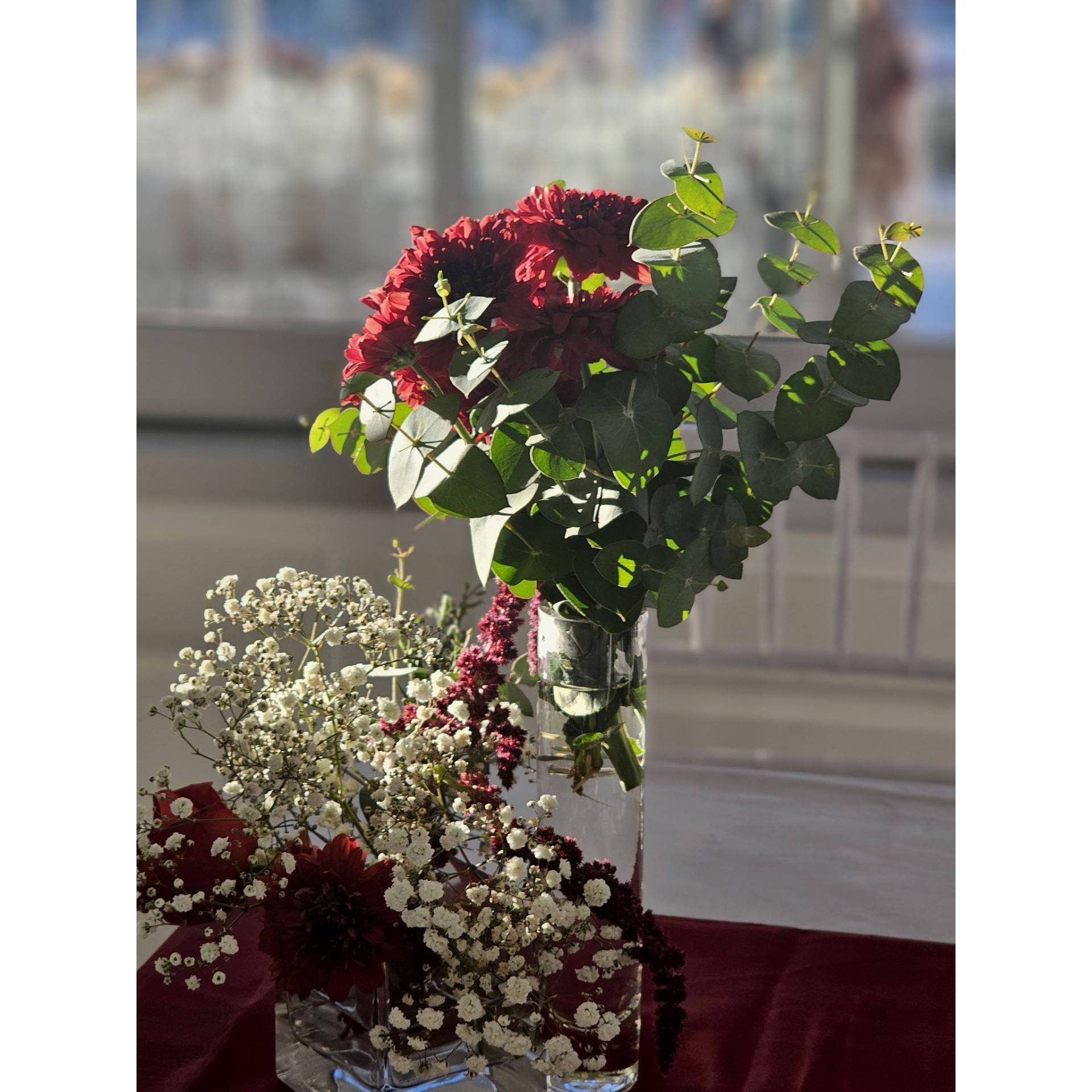 Birthday Backdrop flower decor 2026 1 (2) birthday event decor in Melbourne featuring a red rose hybrid floral arch with white foam letters and balloons by Studio Forever Bloom.