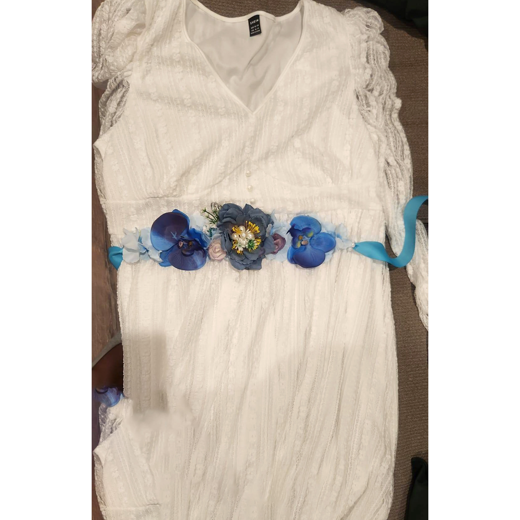 Flower Decor Frock decor (1) Blue and pink silk floral maternity sashes hanging on a wooden hanger by Studio Forever Bloom Melbourne.