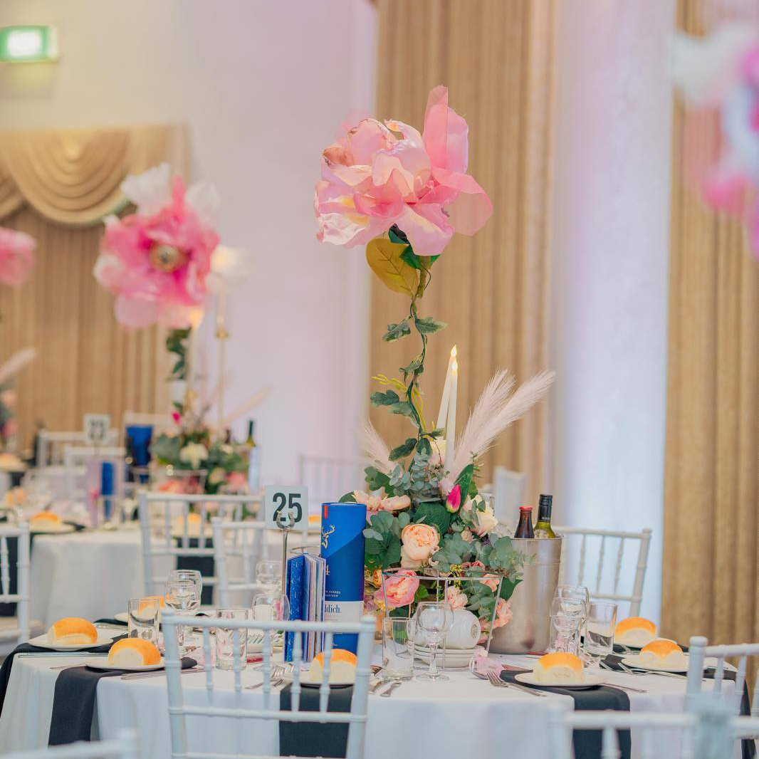 Giant Handmade Floral Decor V1 - Big Blooms 1 (14) Large pink handmade "Big Bloom" floral arrangement on a black table for a Melbourne event by Studio Forever Bloom.
