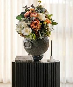 Modern KALAYA clay pot with luxury silk rose and dahlia floral arrangement on a black fluted pedestal by Studio Forever Bloom Melbourne.