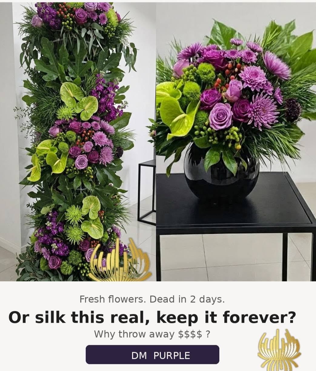 A luxury event decor showcase by Studio Forever Bloom featuring a tall purple and green hybrid floral pillar next to matching silk centerpieces in black pots.