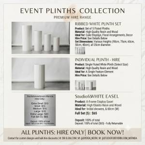 Premium white fluted event plinths for hire in Mernda, ideal for weddings, cake displays, floral arrangements, and luxury event styling.
