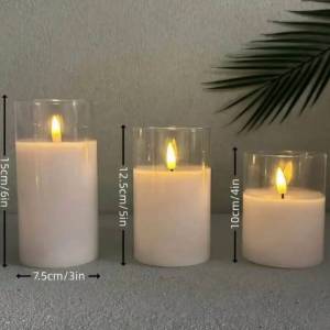 Set of three glass-encased frameless LED candles with warm flickering flames in varying heights.