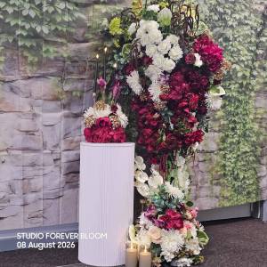 Set of five white fluted cylinder plinths in different heights for wedding and event hire in Melbourne.